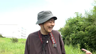 野鳥を見る田中